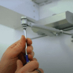 OVERHEAD DOOR CLOSER INSTALLATION SERVICE, buy the service of overhead door closer of home and offices from sanushaa technologies pvt ltd.