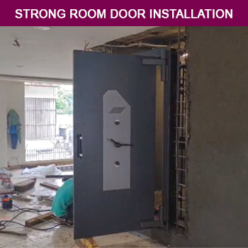 A professional technician performing the installation and repair of a Godrej strong room door. The process involves precise adjustments and secure fittings to enhance safety and functionality. Ideal for banks, vaults, and high-security areas.